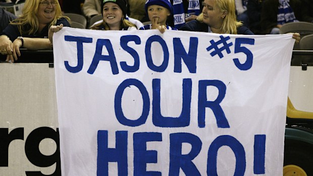 Kangaroo fans with a banner for Jason McCartney