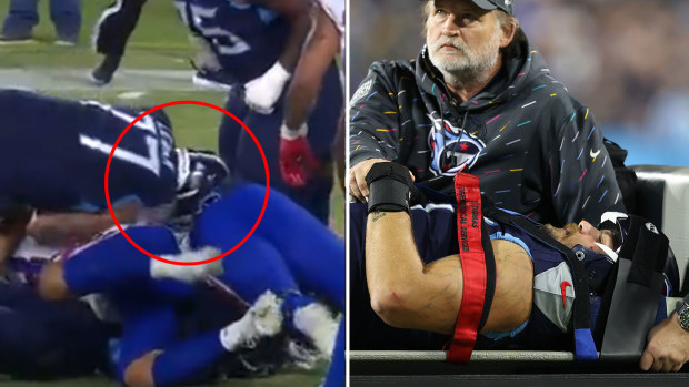Offensive tackle Taylor Lewan #77 of the Tennessee Titans is carted off after being injured against the Buffalo Bill