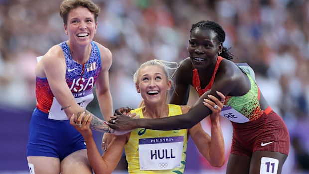 Australia's Jessica Hull is embraced by two of her rivals after winning Olympic silver in the women's 1500m.