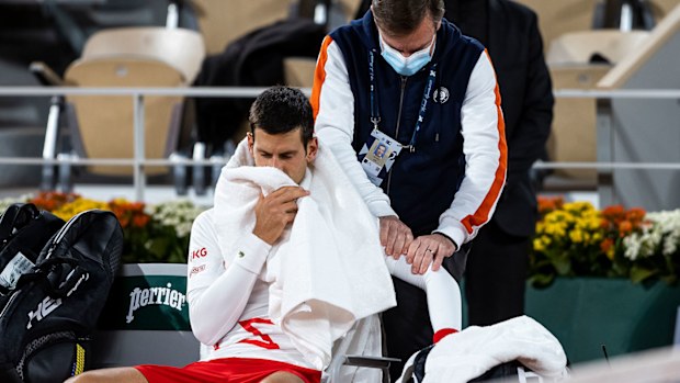 Novak Djokovic receives medical treatment
