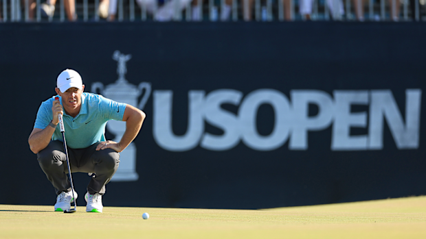 Rory McIlroy lines up a putt on the 14th hole during the final round of the 2023 US Open Championship.