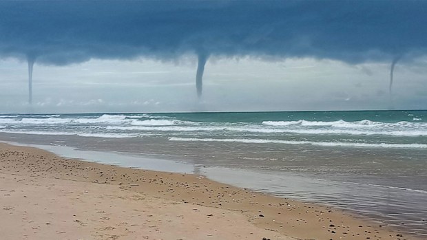 Waterspouts formed over Old Bar Beach on the NSW mid-north coast this afternoon.
