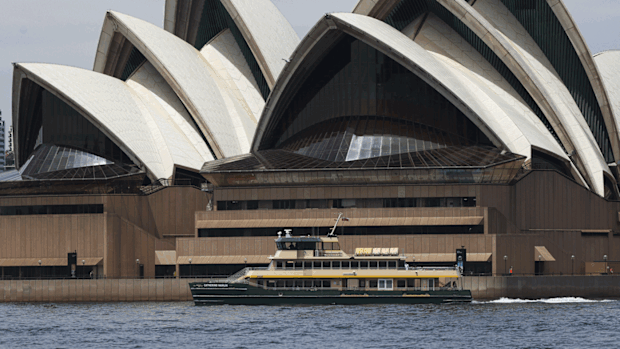 One of the Emerald-class ferries passing the Sydney Opera House.