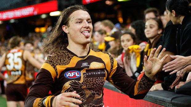 Jack Ginnivan of the Hawks celebrates with fans after a win during the 2024 AFL Round 11 match between the Hawthorn Hawks and the Brisbane Lions at Marvel Stadium on May 26, 2024 in Melbourne, Australia. (Photo by Dylan Burns/AFL Photos via Getty Images)