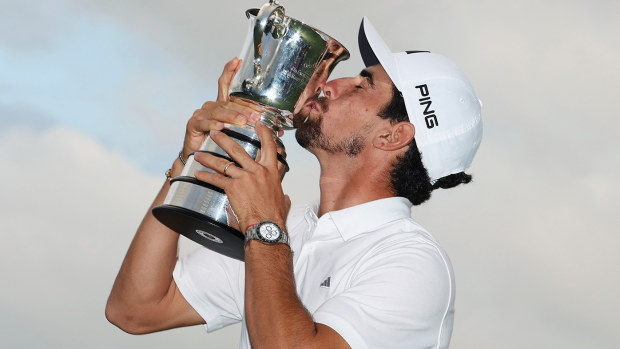 Joaquin Niemann of Chile kisses the Stonehaven Cup after winning the Men's ISPS HANDA Australian Open on the 18th green following the ISPS HANDA Australian Open at The Australian Golf Course on December 03, 2023 in Sydney, Australia. (Photo by Mark Metcalfe/Getty Images)