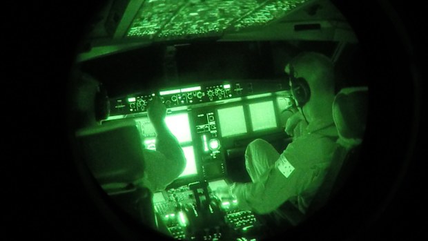 Night Vision image of Royal Australian Air Force Air Task Group KC-30A Multi Role Tanker Transport crew at work during the first mission of Operation OKRA flown over Syria. (AAP)