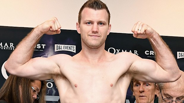  Jeff Horn jumps on the scales and makes weight 