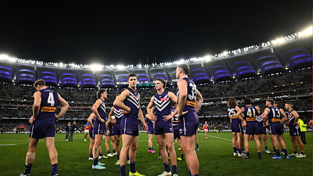 Fremantle players after the loss to Brisbane.