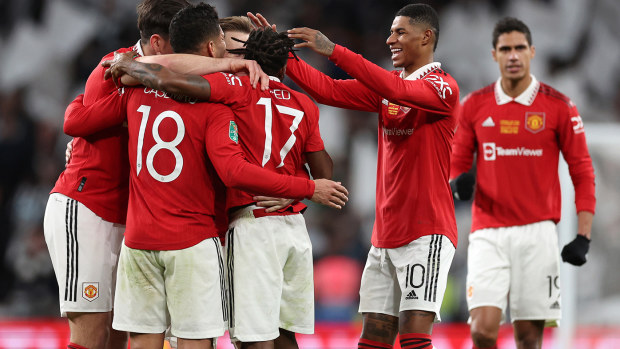 Manchester United players celebrate their win over Newcastle.