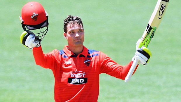 Alex Carey of the Redbacks celebrates bringing up his century