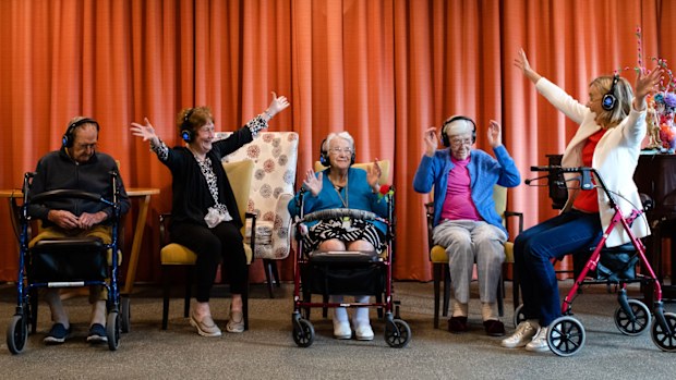 A group of pensioners enjoy a silent disco at Glades Bay Gardens nursing home, in New South Wales, Australia.