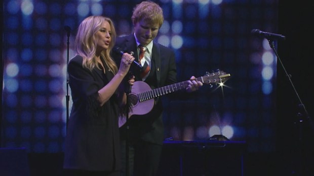 Kylie Minogue and Ed Sheeran on stage at Michael Gudinski memorial at Rod Laver Arena