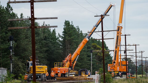 A supplied image obtained on Tuesday, February 25, 2020, shows the removal of an XPT train that derailment in Wallan North, 45km north of Melbourne, Victoria. The Australian Rail Track Corporation together with Transport for NSW expect the removal of the final train carriages and locomotives to be completed today