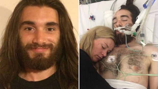 Jaiden Walker with his mother Heidi in the ICU. (Facebook)