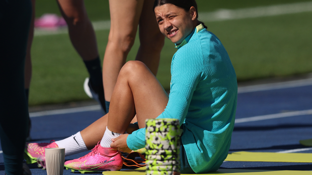 Sam Kerr with boots on, ready to participate in Matildas training on Sunday.