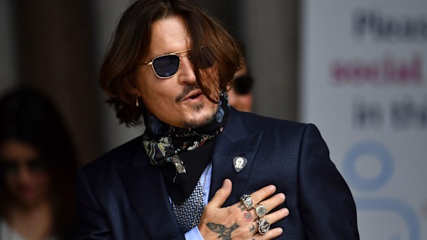 Johnny Depp arrives at the Royal Courts of Justice, the Strand on July 24, 2020 in London, England