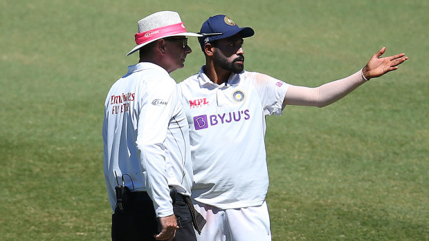 Mohammed Siraj of India speaks to Umpire Paul Reiffel 