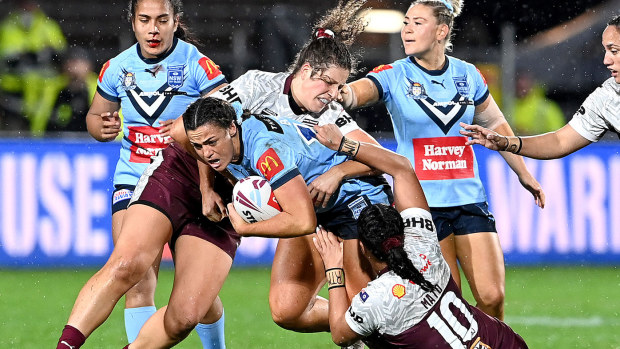 Millie Boyle of New South Wales takes on the defence during the Women's Rugby League State of Origin match at the Sunshine Coast Stadium on June 25, 2021 in Sunshine Coast, Australia. (Photo by Bradley Kanaris/Getty Images)