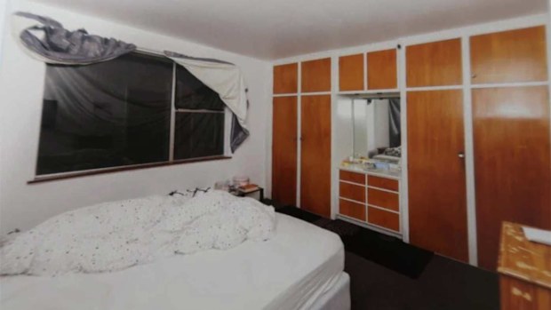 The windows were taped shut to keep the room dark, cold and unventilated.