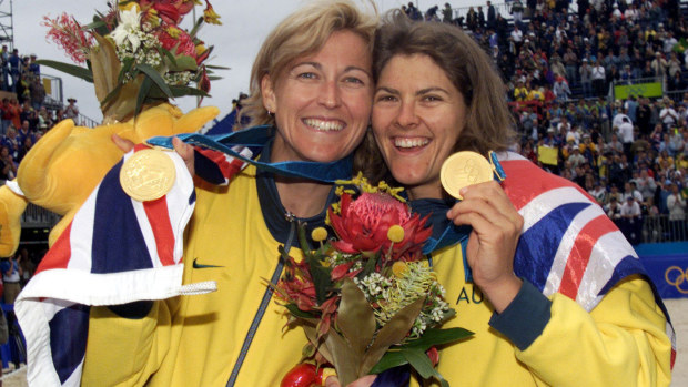 25 Sep 2000: Kerri Pottharst and Natalie Cook of Australia celebrate after their win over Brazil to win the Gold medal, in the final of the Women's Beach Volleyball at the Sydney 2000 Olympic Games, held at the Beach Volleyball Centre in Bondi, Sydney,Australia. DIGITAL IMAGE Mandatory Credit: Hamish Blair/ALLSPORT