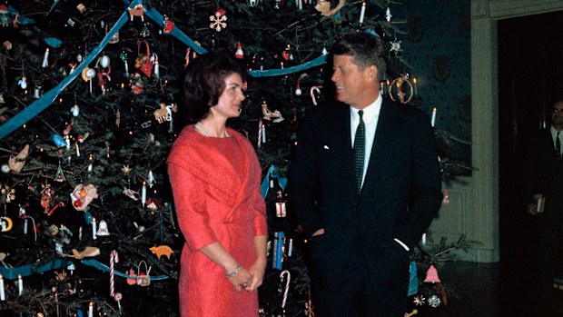 John F Kennedy and Jackie Kennedy with their 1961 White House Christmas tree.