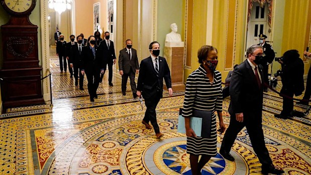 Democratic House impeachment managers as they walk through the Capitol Hill to deliver to the Senate the article of impeachment alleging incitement of insurrection against former President Donald Trump.