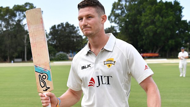 Cameron Bancroft walks off to applause
