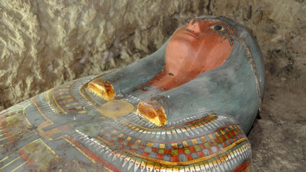 a sarcophagus containing a millennia-old mummy which was found by Spanish archaeologists near the southern Egyptian town of Luxor. The body was found in a tomb likely dating from between 1075-664 B.C., on the west bank of the Nile