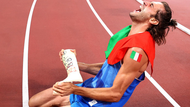 Gold medalist Gianmarco Tamberi of Team Italy celebrates with the cast from the foot he broke just before the 2016 Olympics.