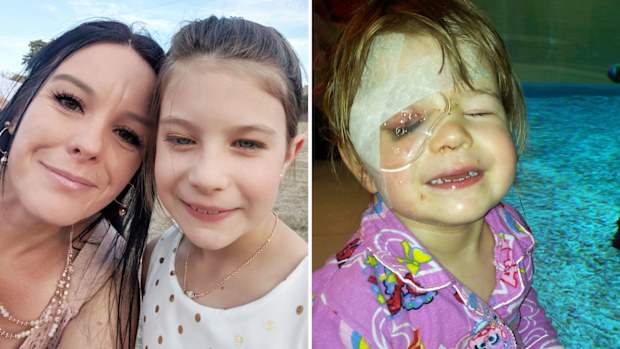 Jodie Thomas and her daughter Dakota, whose right eye is still noticeably different in appearance after a serious accident in a Target store several years ago. 