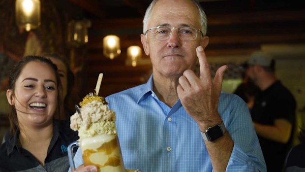 Malcolm Turnbull tries a Golden Gaytime-flavoured milkshake. (AAP)