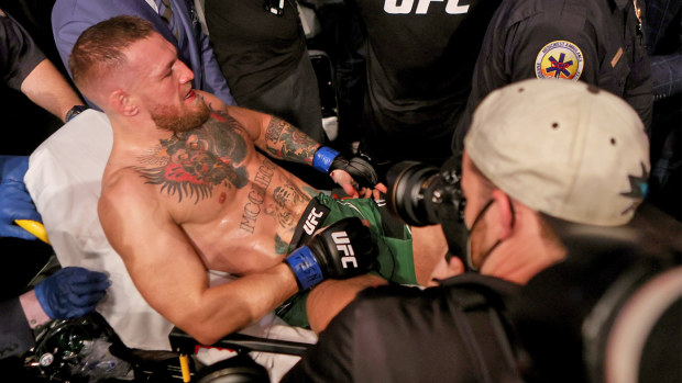 Conor McGregor is stretchered off