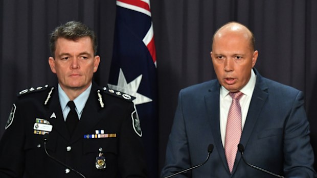 Australian Federal Police Commissioner Andrew Colvin and Minister for Home Affairs Peter Dutton.