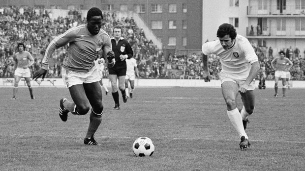 Jean-Pierre Adams (L) from France and Baptista Tamagnini Nene during a friendly international match between France and Portugal.