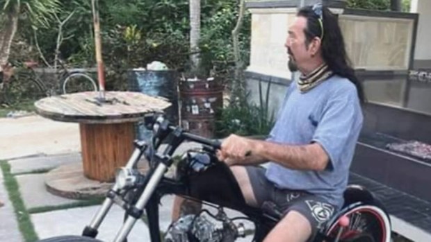 A man is fighting for life after he was allegedly attacked by two men on bikes in broad daylight in Adelaide.