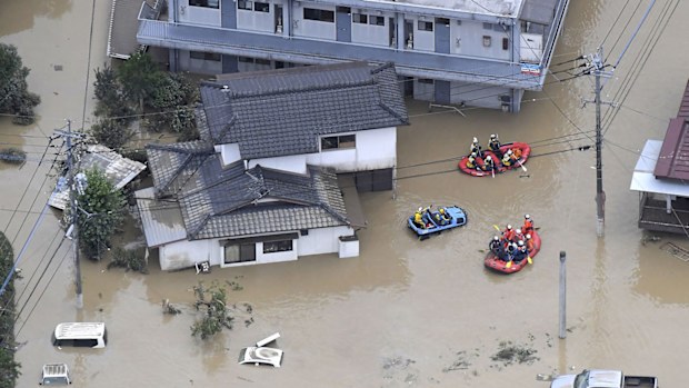 Rescue operation is conducted in a flooded area in Hitoyoshi, Kumamoto prefecture, southern Japan Saturday, July 4, 2020.
