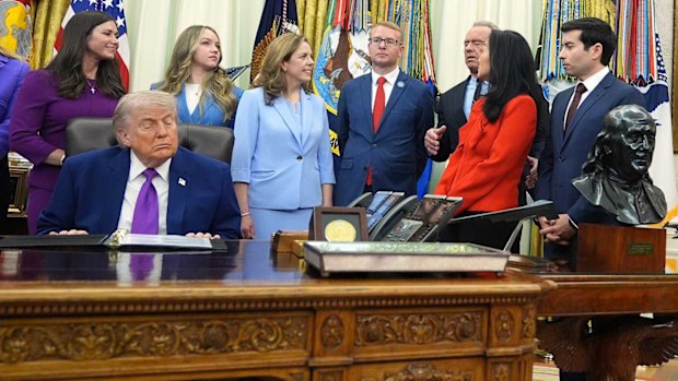 Donald Trump with his eyes closed at an Oval Office meeting.