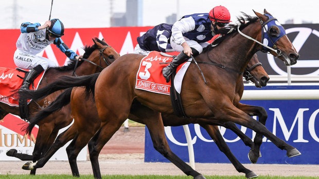 Johnny Get Angry (NZ) ridden by Lachlan King wins the AAMI Victoria Derby at Flemington Racecourse