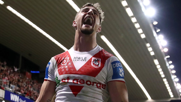 Zac Lomax of the Dragons celebrates after scoring a try during the round 14 NRL match between St George Illawarra Dragons and Wests Tigers at WIN Stadium on June 07, 2024, in Wollongong, Australia. (Photo by Jason McCawley/Getty Images)