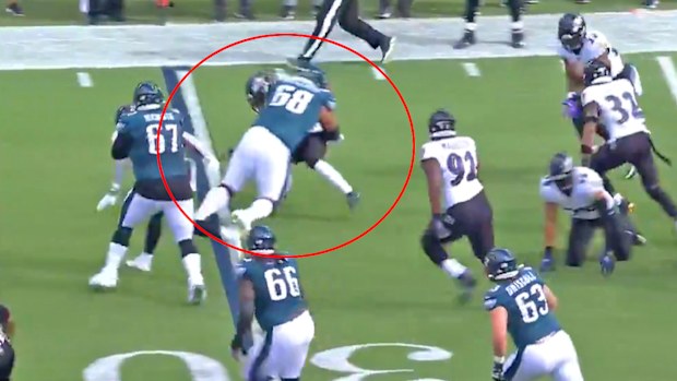 Jordan Mailata makes a crunching tackle