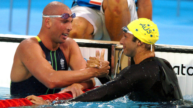 Grant Hackett (left) and Ian Thorpe embrace at the Athens 2004 Olympics.