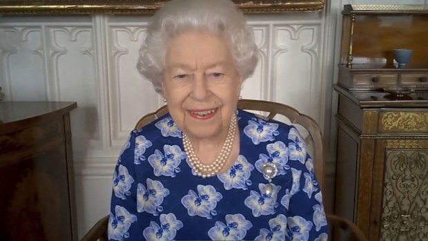 Her Majesty Queen Elizabeth II speaks on a video call to thank volunteers with the Royal Voluntary Service on March 19, 2021 in Windsor, United Kingdom. 