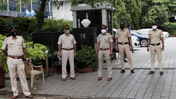 Indian policemen guard outside Chinese consulate anticipating protests in Mumbai, India, Wednesday, June 17, 2020. 