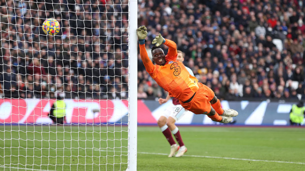 Edouard Mendy of Chelsea fails to stop West Ham's third goal scored by Arthur Masuaku 