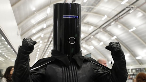 Lord Buckethead of the Monster Raving Loony Party poses for the media as ballot papers are counted at Britain's Prime Minister Boris Johnson's Uxbridge and South Ruislip constituency count declaration at Brunel University in Uxbridge, London.