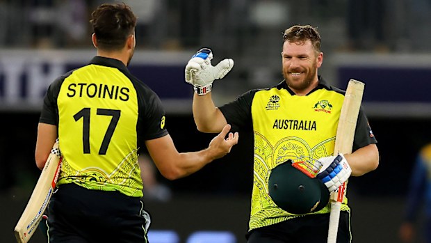 Aaron Finch and Marcus Stoinis celebrate after hitting the winning runs against Sri Lanka