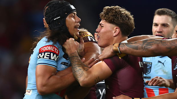Jarome Luai of the Blues and Reece Walsh of the Maroons scuffle during game two of the State of Origin series.