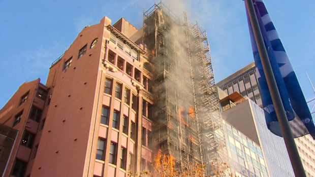Lockhard Chambers on Macquarie Street erupted in flames only days after its cladding was removed. 