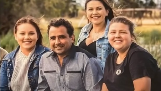 Mr Mammone, pictured with his three daughters.