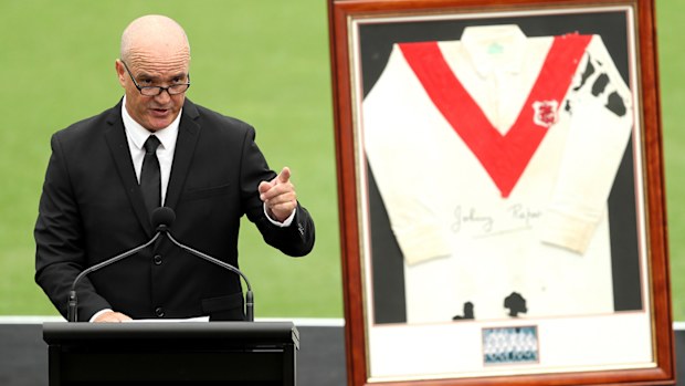 Kurt Raper speaks at the funeral for his father, John, at the SCG.